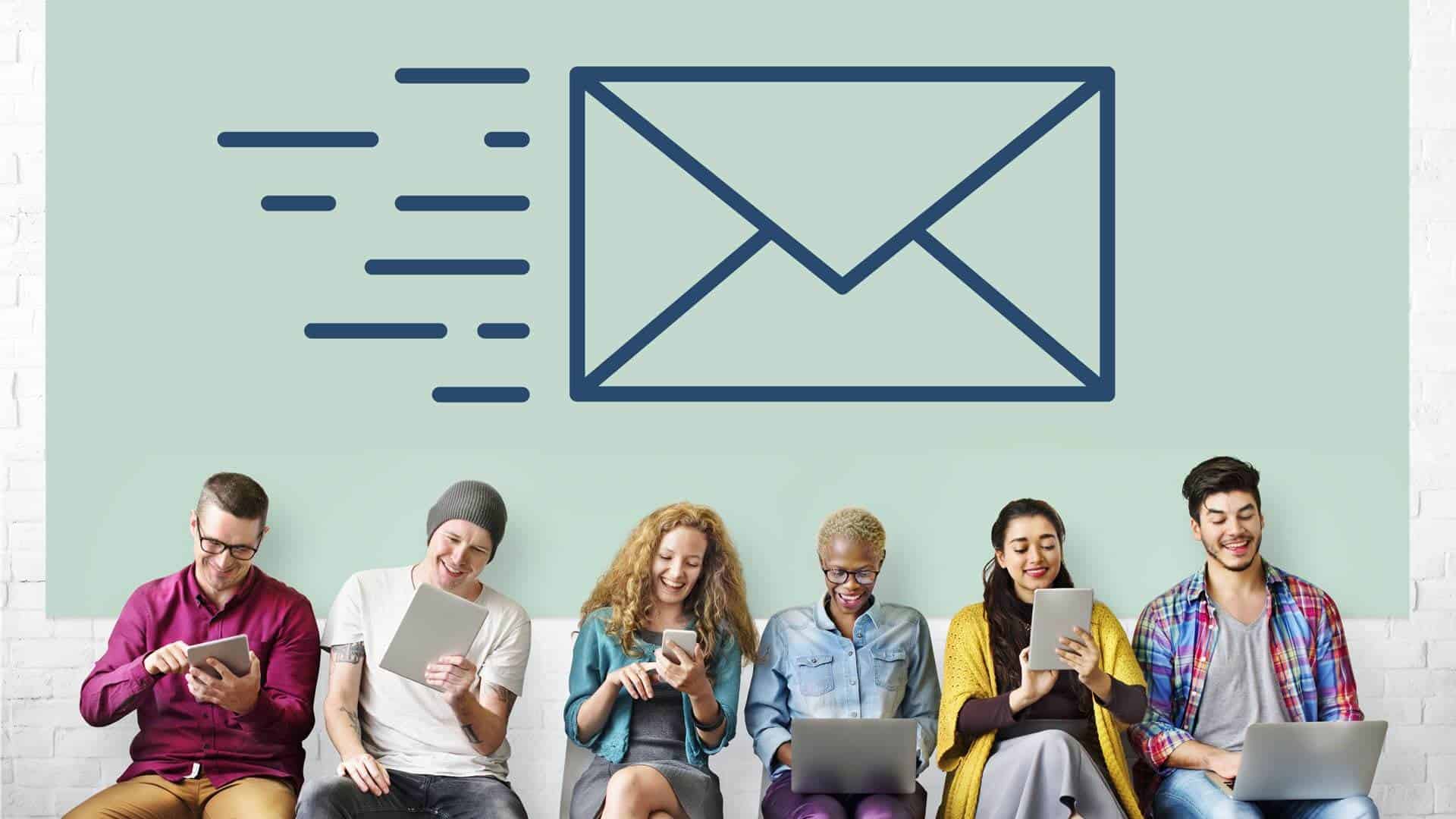 A group of people enthusiastically sitting in front of an email icon, celebrating the importance of morning emails.